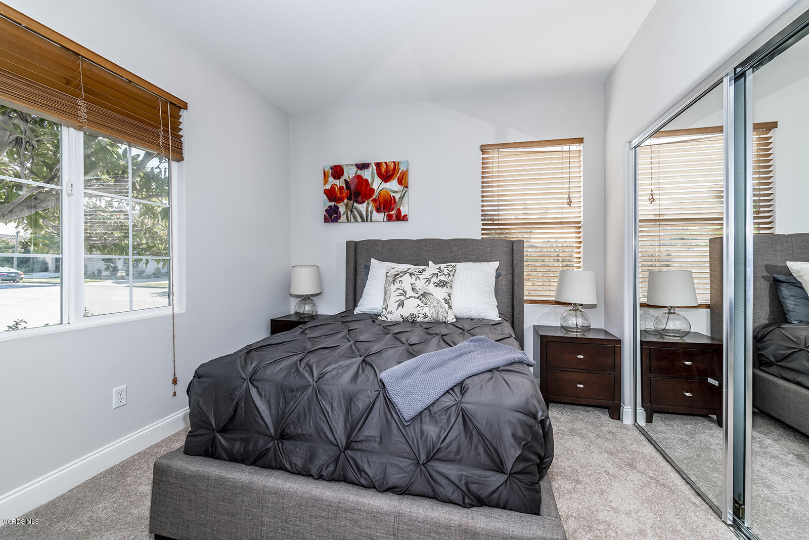 641 Riviera Court Oxnard, CA 93035 - Photo 14 of 18 a bedroom with a bed and a window