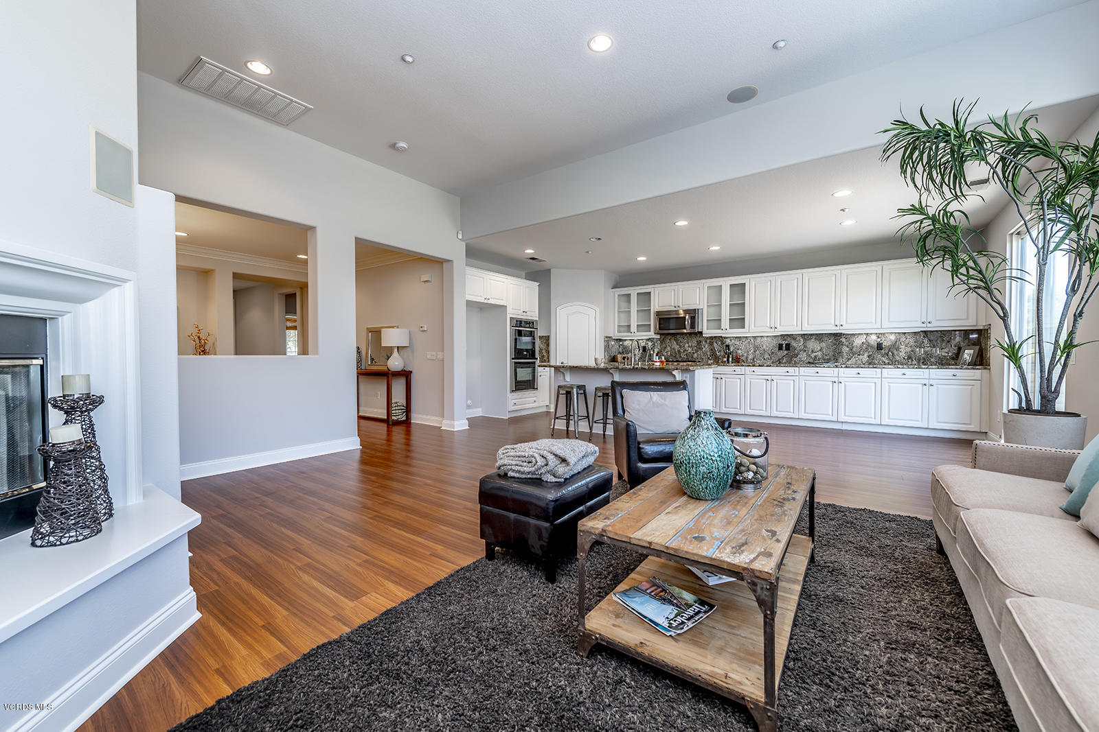 641 Riviera Court Oxnard, CA 93035 - Photo 6 of 18 a living room with furniture and a wooden floor