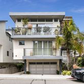 a front view of a building with parking space