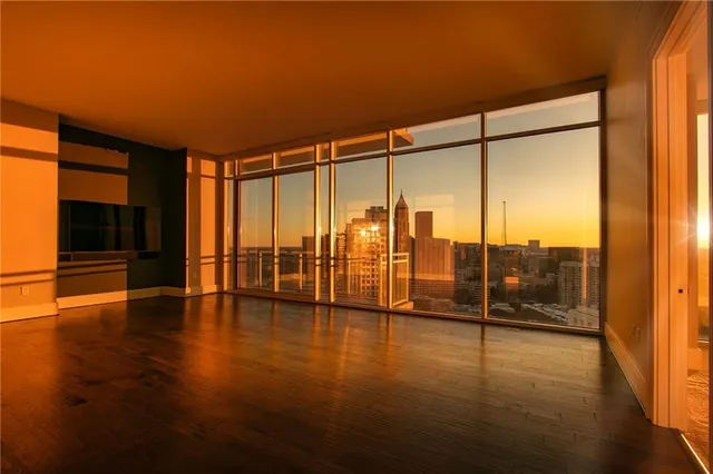 a view of an empty room and window