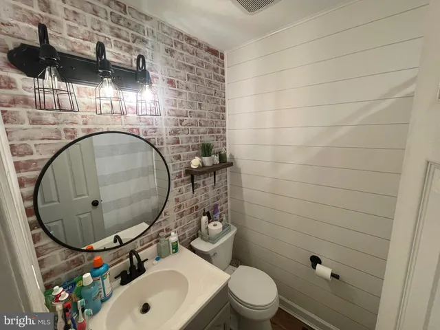 a bed room with furniture and a window