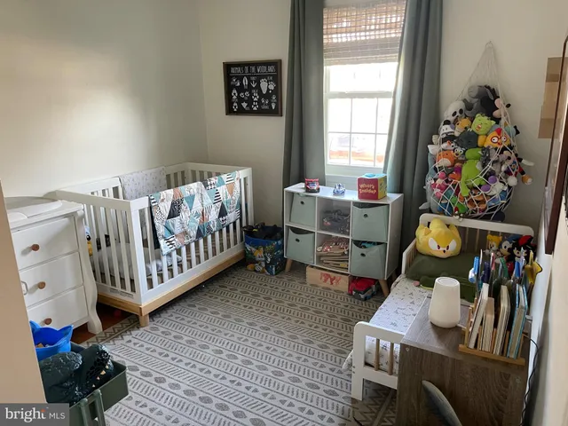 a kitchen with lots of clutter and cabinets