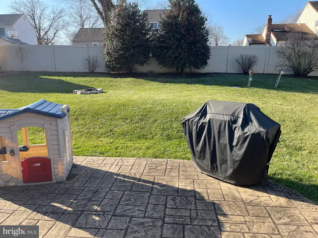 a view of swimming pool with a patio