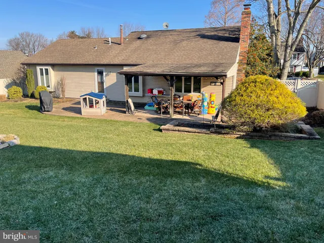 a view of a storage room with a table and chairs