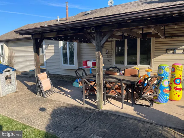 a view of a backyard of the house