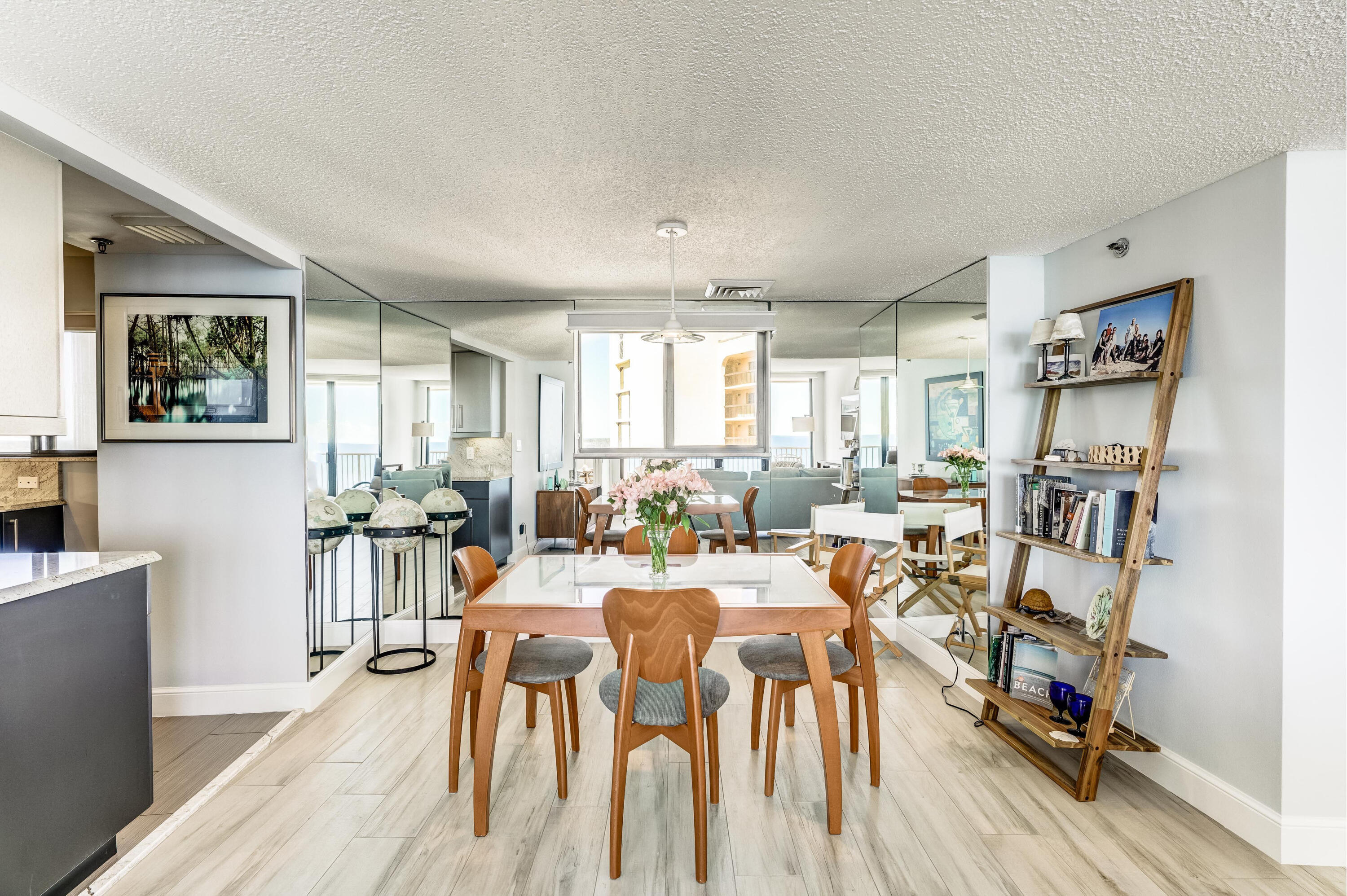 200 Ocean Trail Way, Unit 1107 Jupiter, FL 33477 - Photo 20 of 29 a view of a dining room with furniture and wooden floor