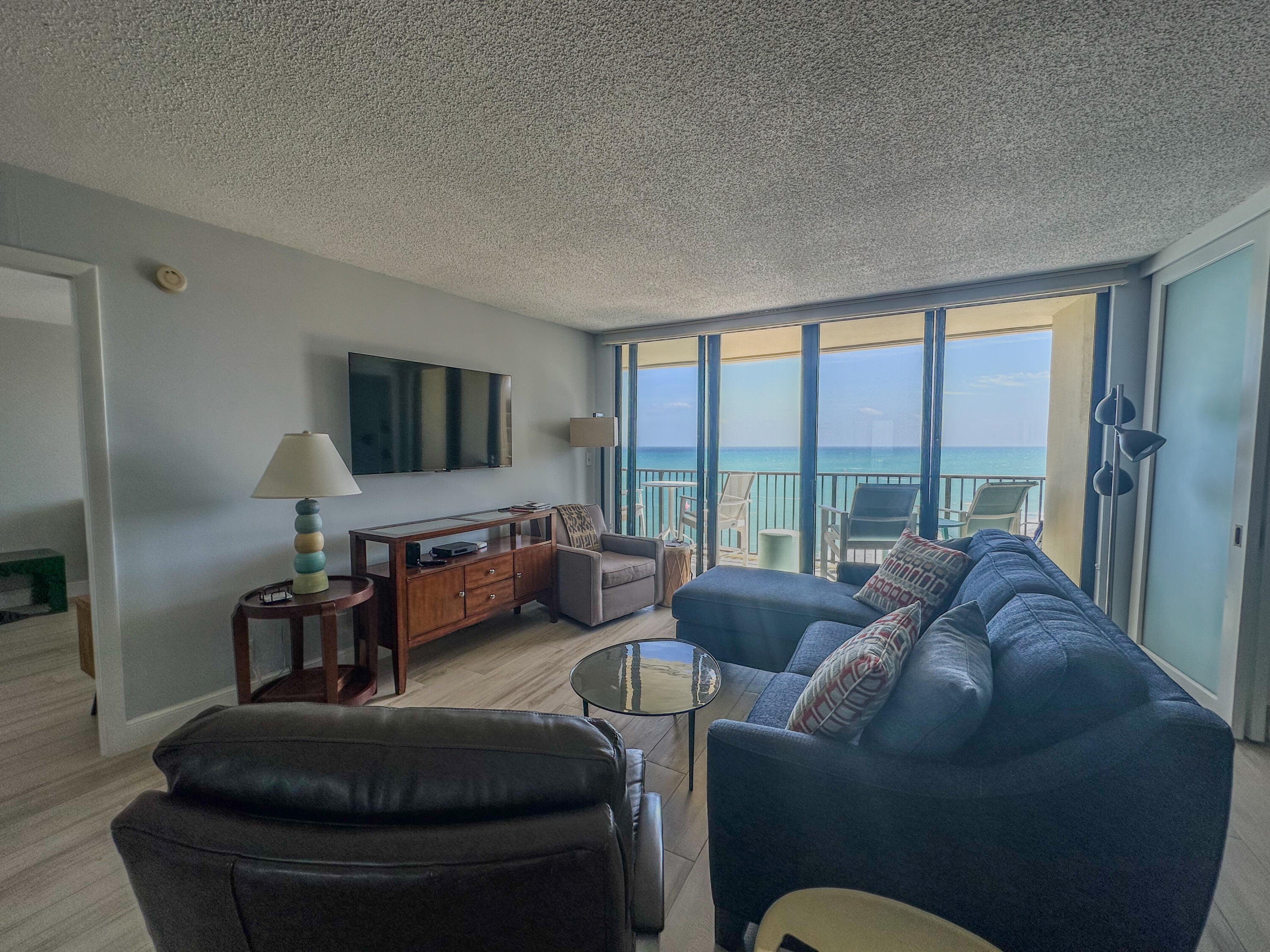 200 Ocean Trail Way, Unit 1107 Jupiter, FL 33477 - Photo 23 of 29 a living room with furniture and a large window
