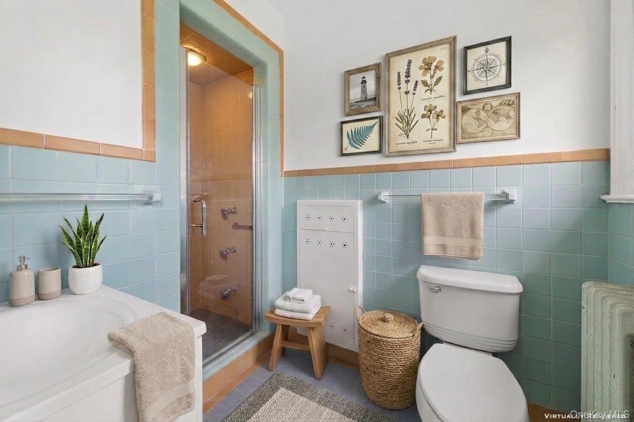 17 Old Orchard Road New Rochelle, NY 10804 - Photo 15 of 32 a bathroom with a toilet and a shower