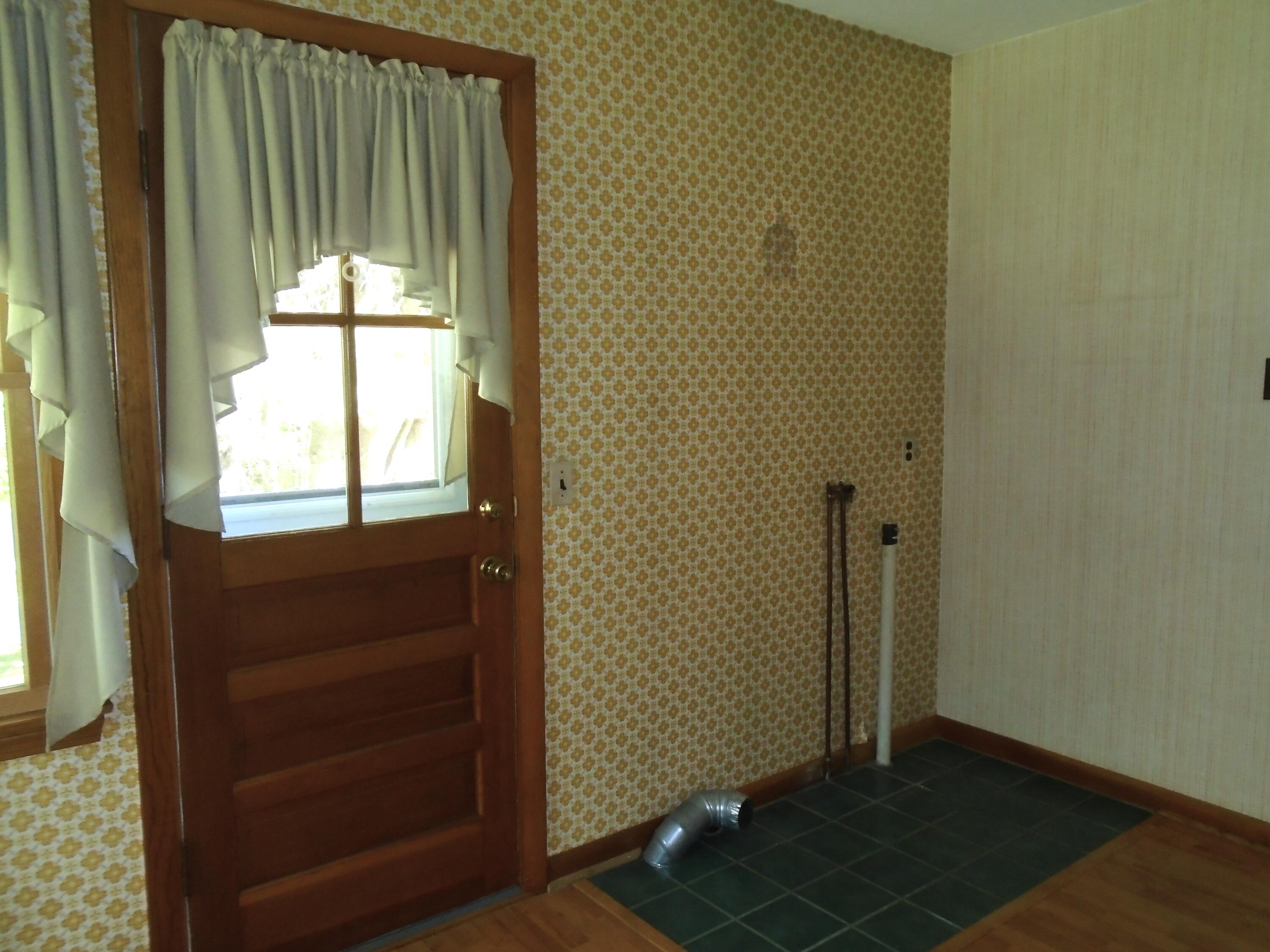 240 Ohio Hill Road Fairfield, ME 04937 - Photo 10 of 28 Laundry Room with Door to Deck