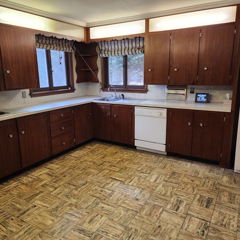 183 Lebanon Hill Road Southbridge, MA 01550 - Photo 13 of 40 a kitchen with a sink and cabinets