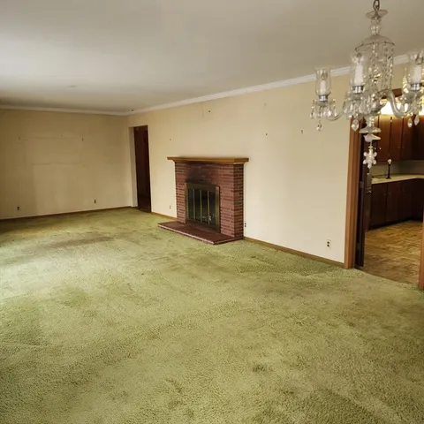 a view of a livingroom with a fireplace