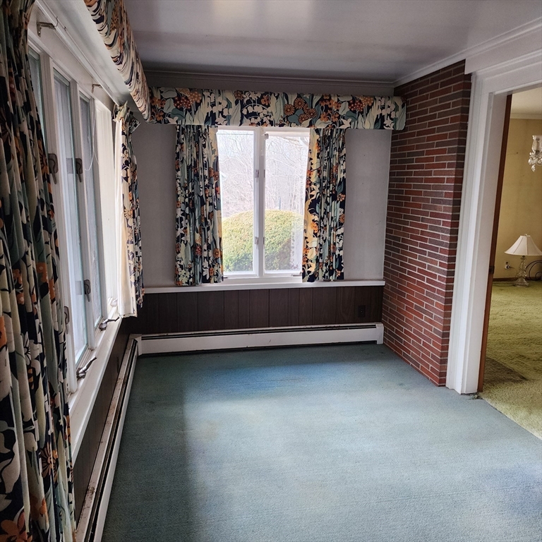 183 Lebanon Hill Road Southbridge, MA 01550 - Photo 22 of 40 a view of room with window and hardwood floor