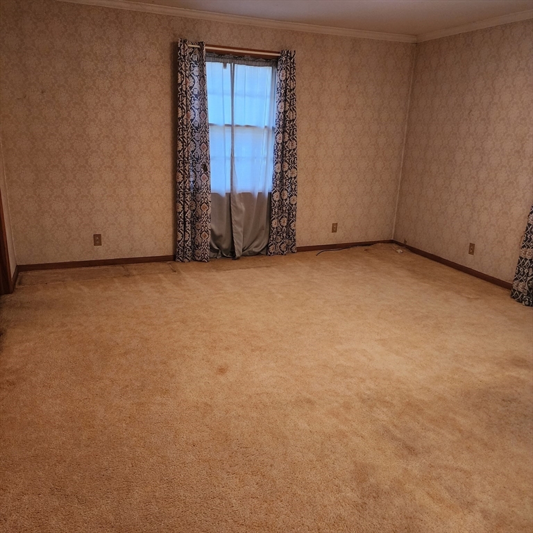 183 Lebanon Hill Road Southbridge, MA 01550 - Photo 24 of 40 a view of an empty room with a fireplace