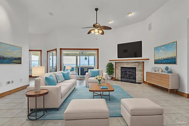 a view of an empty room with a fireplace