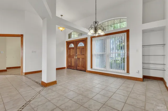 a view of a living room filled with furniture