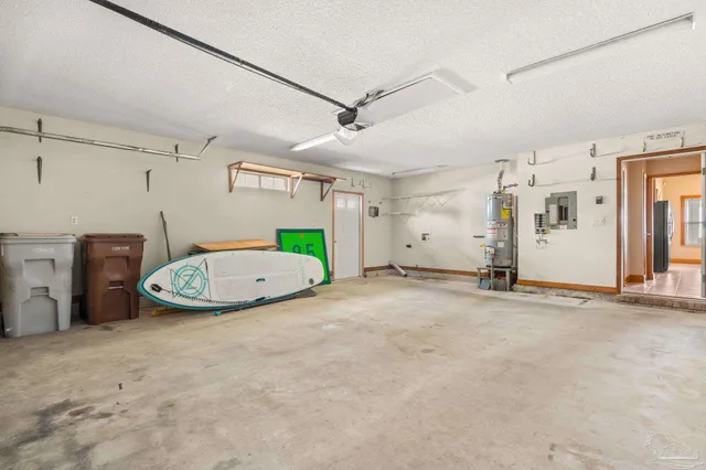 a backyard of a house with yard and outdoor seating