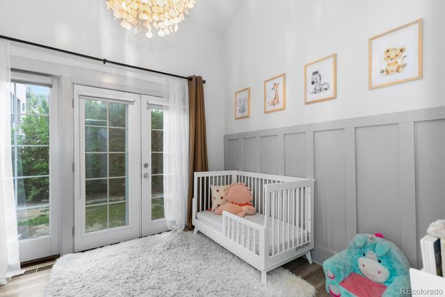 a bedroom with furniture and a window