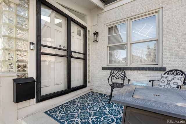 a bathroom with a sink and a window