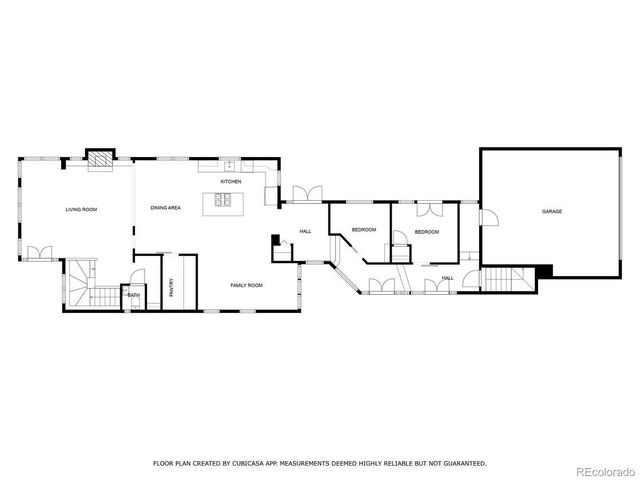 a black and white photo of a living room