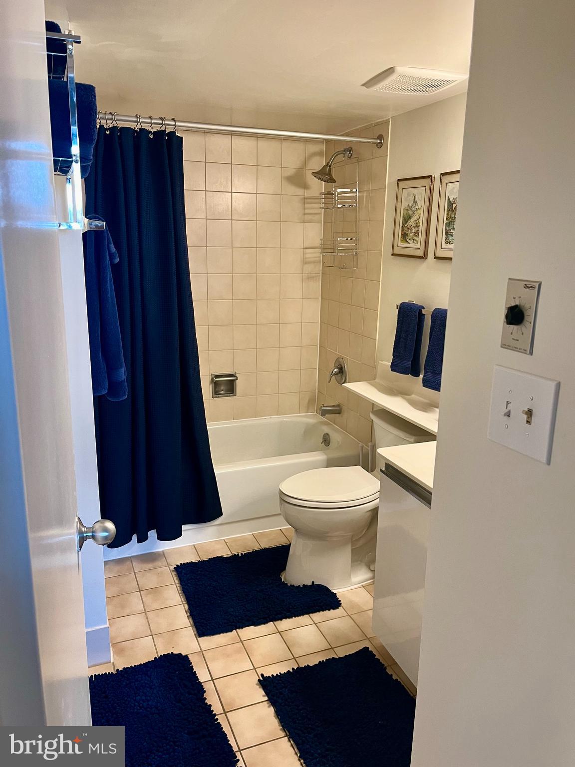 1808 Old Meadow Road, Unit 1104 McLean, VA 22102 - Photo 29 of 35 a bathroom with a toilet a sink and shower
