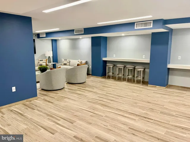 a living room with a couch and a flat screen tv