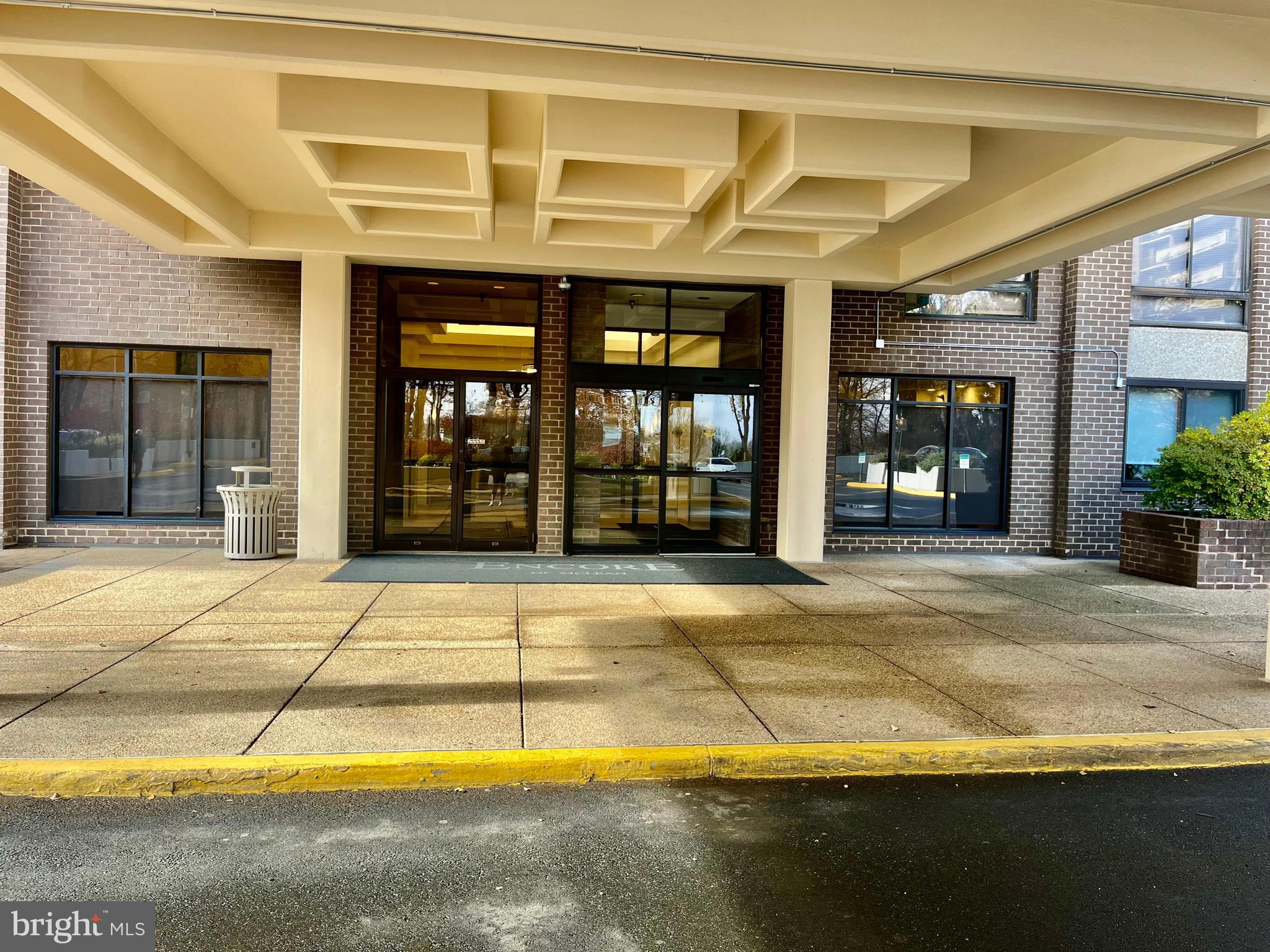 1808 Old Meadow Road, Unit 1104 McLean, VA 22102 - Photo 4 of 35 a view of a building with door