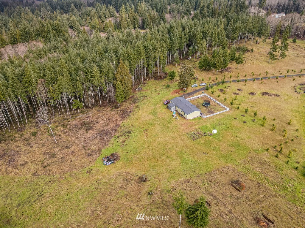 878 Oak Point Road Longview, WA 98632 - Photo 2 of 32 a view of a yard with an outdoor space
