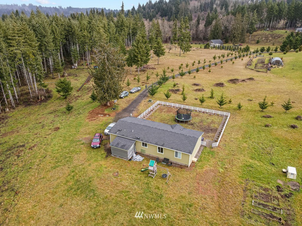 878 Oak Point Road Longview, WA 98632 - Photo 3 of 32 a view of a yard with an outdoor space