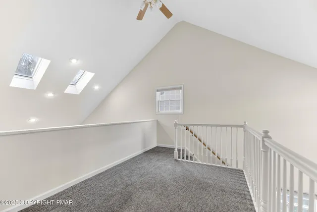 a view of staircase with white walls and white walls