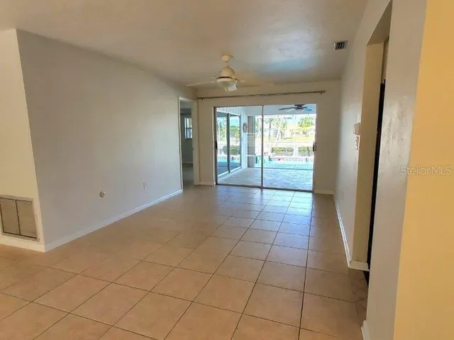 a view of an empty room and window