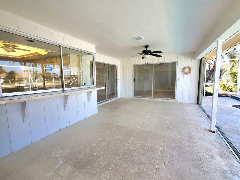 1450 Appian Drive Punta Gorda, FL 33950 - Photo 20 of 35 a view of a kitchen with a sink and a large window