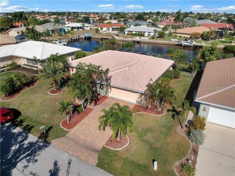 1450 Appian Drive Punta Gorda, FL 33950 - Photo 2 of 35 an aerial view of a house with yard
