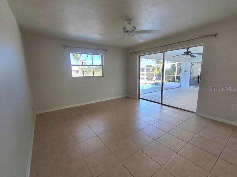 1450 Appian Drive Punta Gorda, FL 33950 - Photo 29 of 35 a view of an empty room with glass door