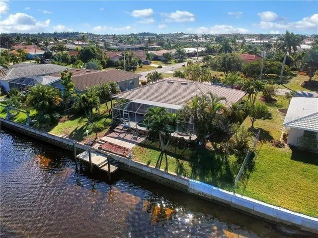 an aerial view of lake residential house with outdoor space