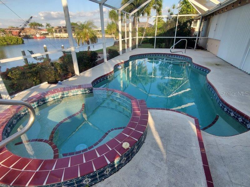 1450 Appian Drive Punta Gorda, FL 33950 - Photo 6 of 35 a view of a swimming pool with sitting area