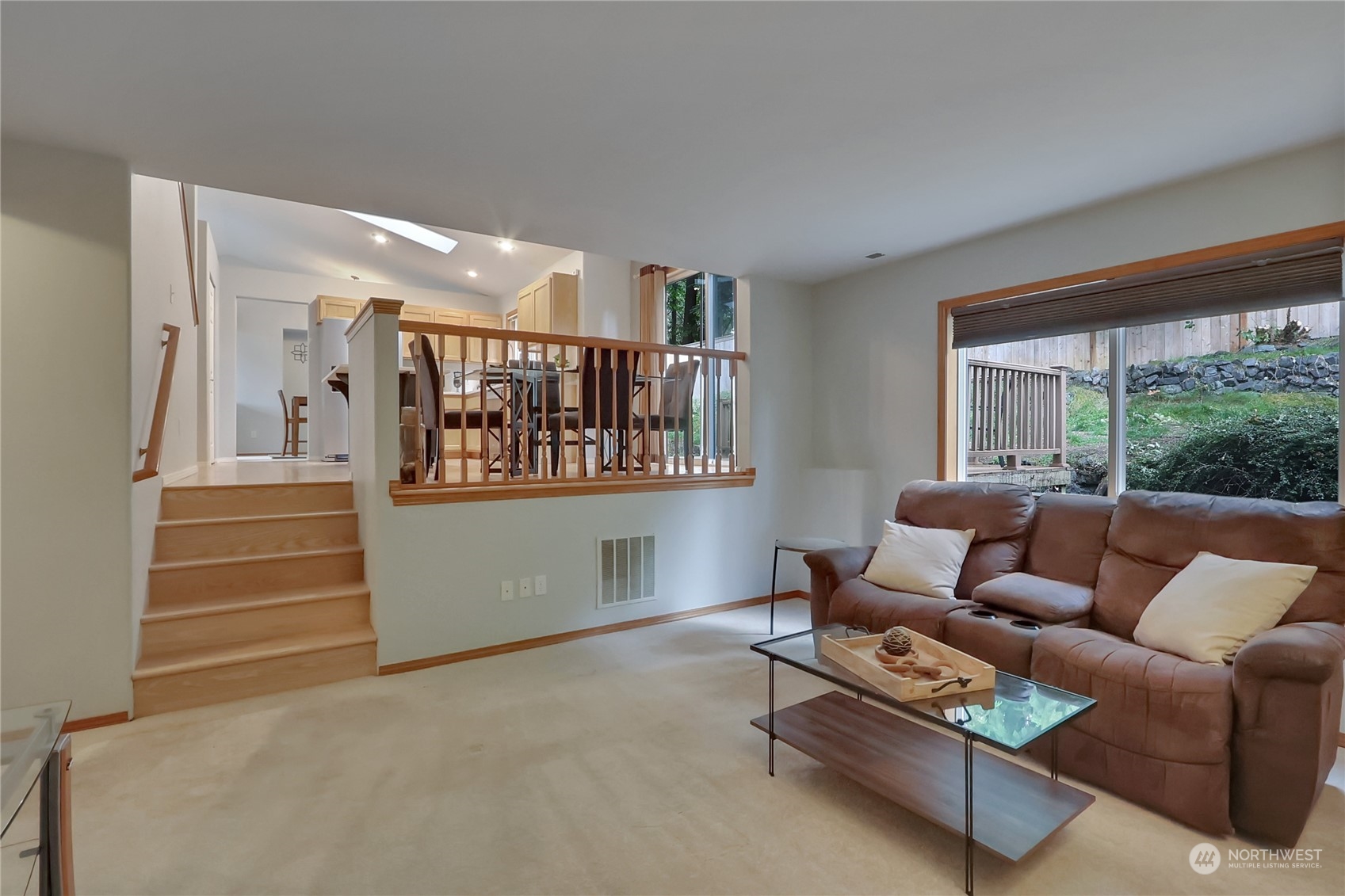 3430 201st Place Southeast Bothell, WA 98012 - Photo 15 of 32 a living room with furniture and a window
