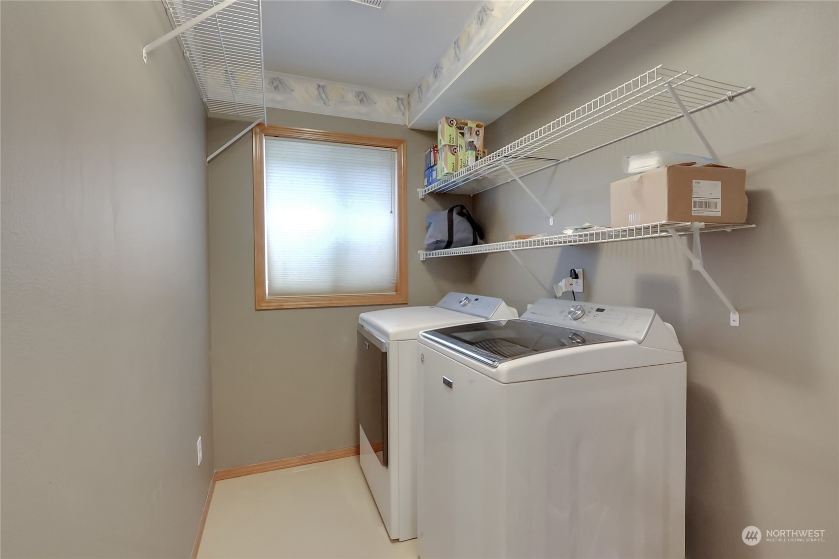 3430 201st Place Southeast Bothell, WA 98012 - Photo 26 of 32 a utility room with dryer and washer