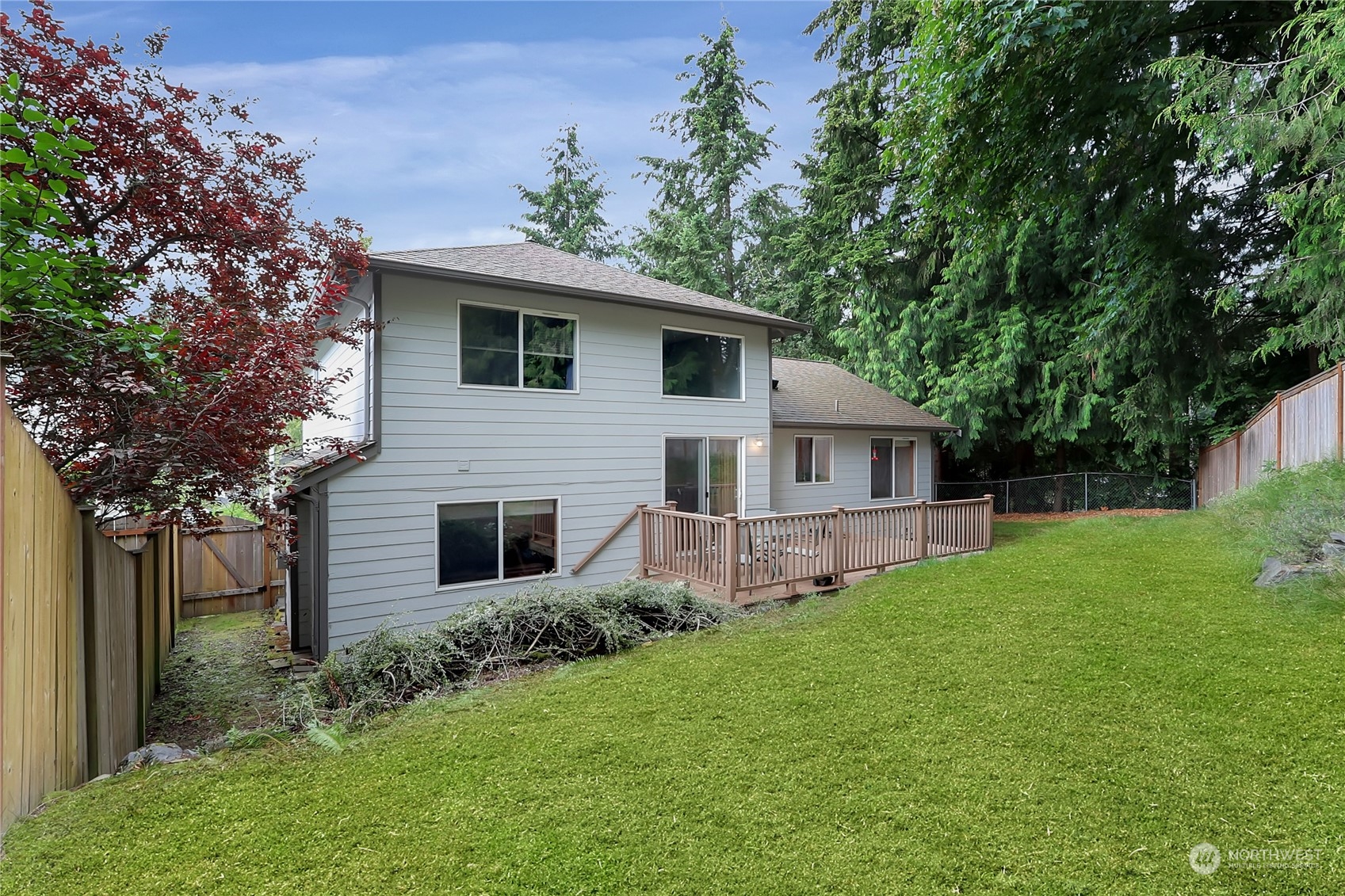 3430 201st Place Southeast Bothell, WA 98012 - Photo 27 of 32 a front view of a house with garden