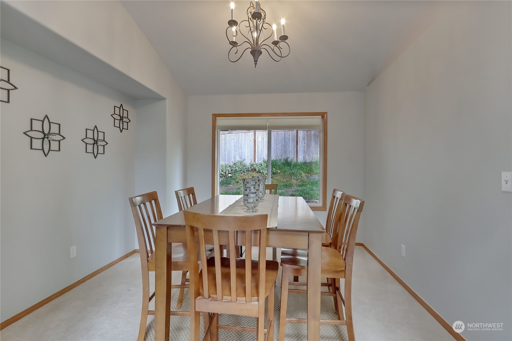 3430 201st Place Southeast Bothell, WA 98012 - Photo 6 of 32 a view of a dining room with furniture window and outside view