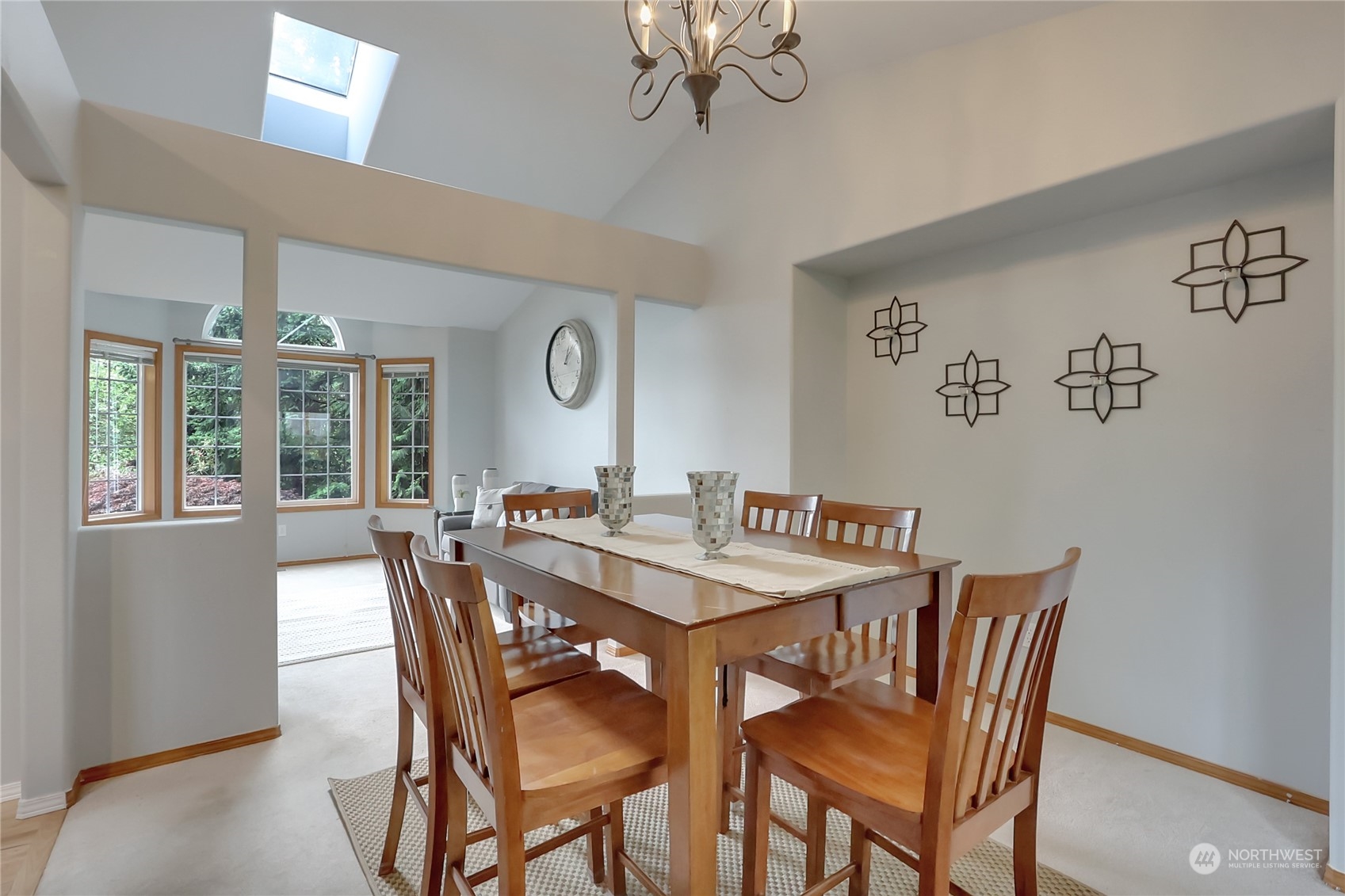 3430 201st Place Southeast Bothell, WA 98012 - Photo 7 of 32 a view of a dining room with furniture and window