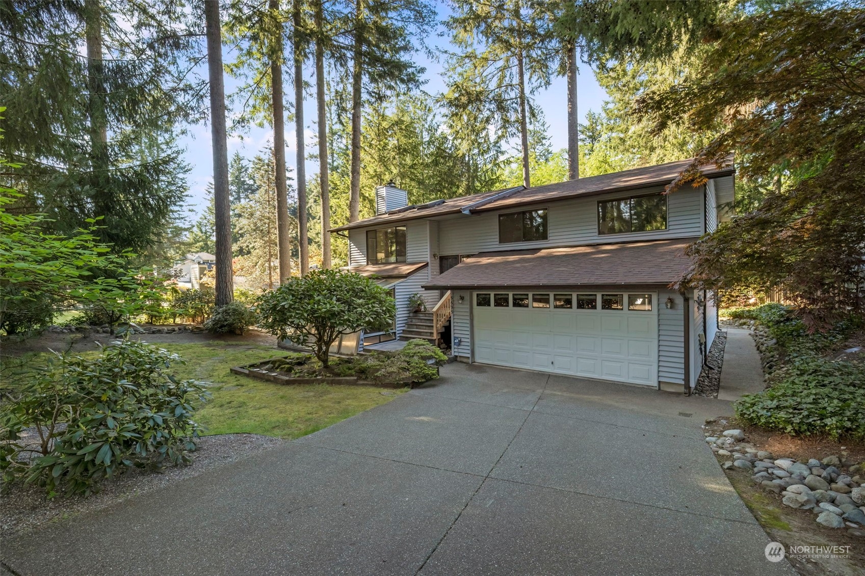 a house with trees in front of it