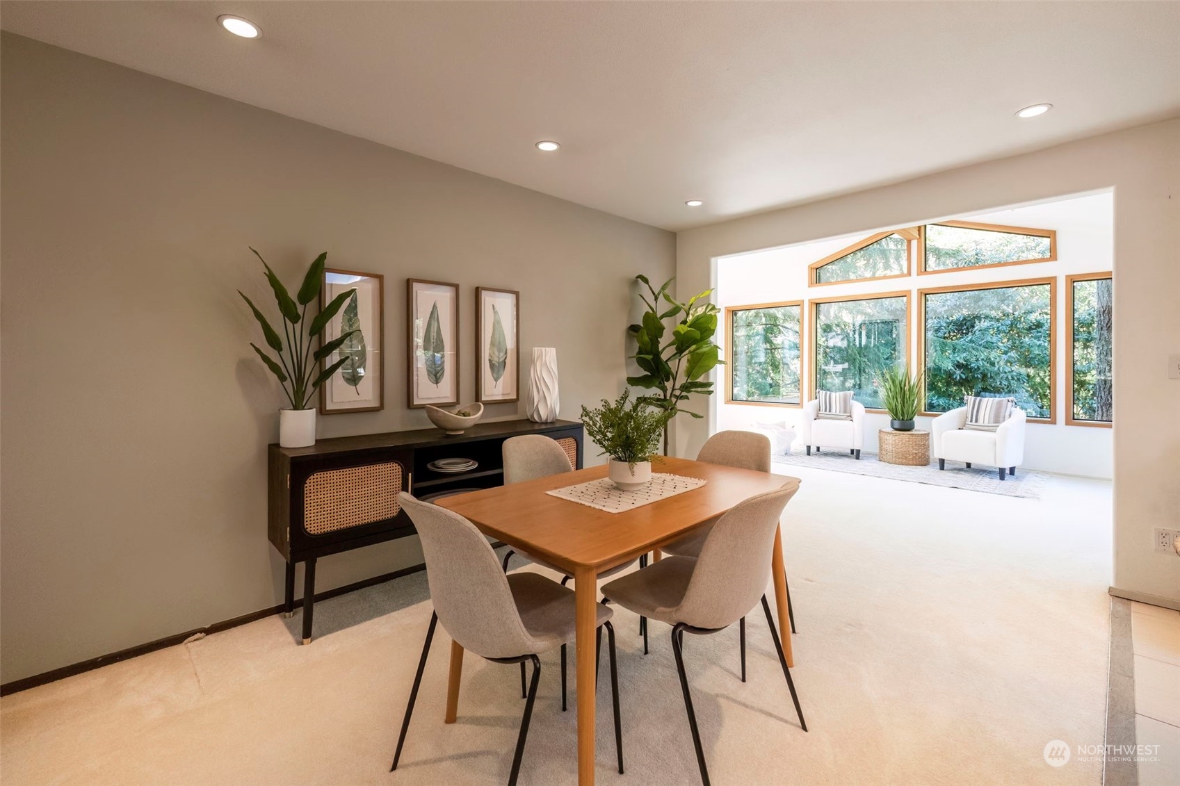 5695 Southwest 44th Street Port Orchard, WA 98367 - Photo 15 of 40 a view of a dining room with furniture and a window