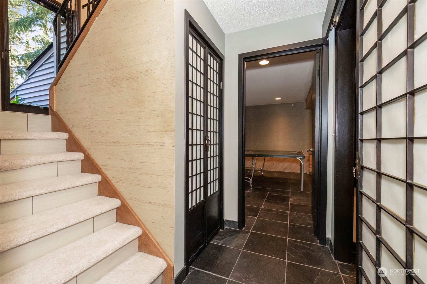 5695 Southwest 44th Street Port Orchard, WA 98367 - Photo 29 of 40 a view of staircase with white walls and door