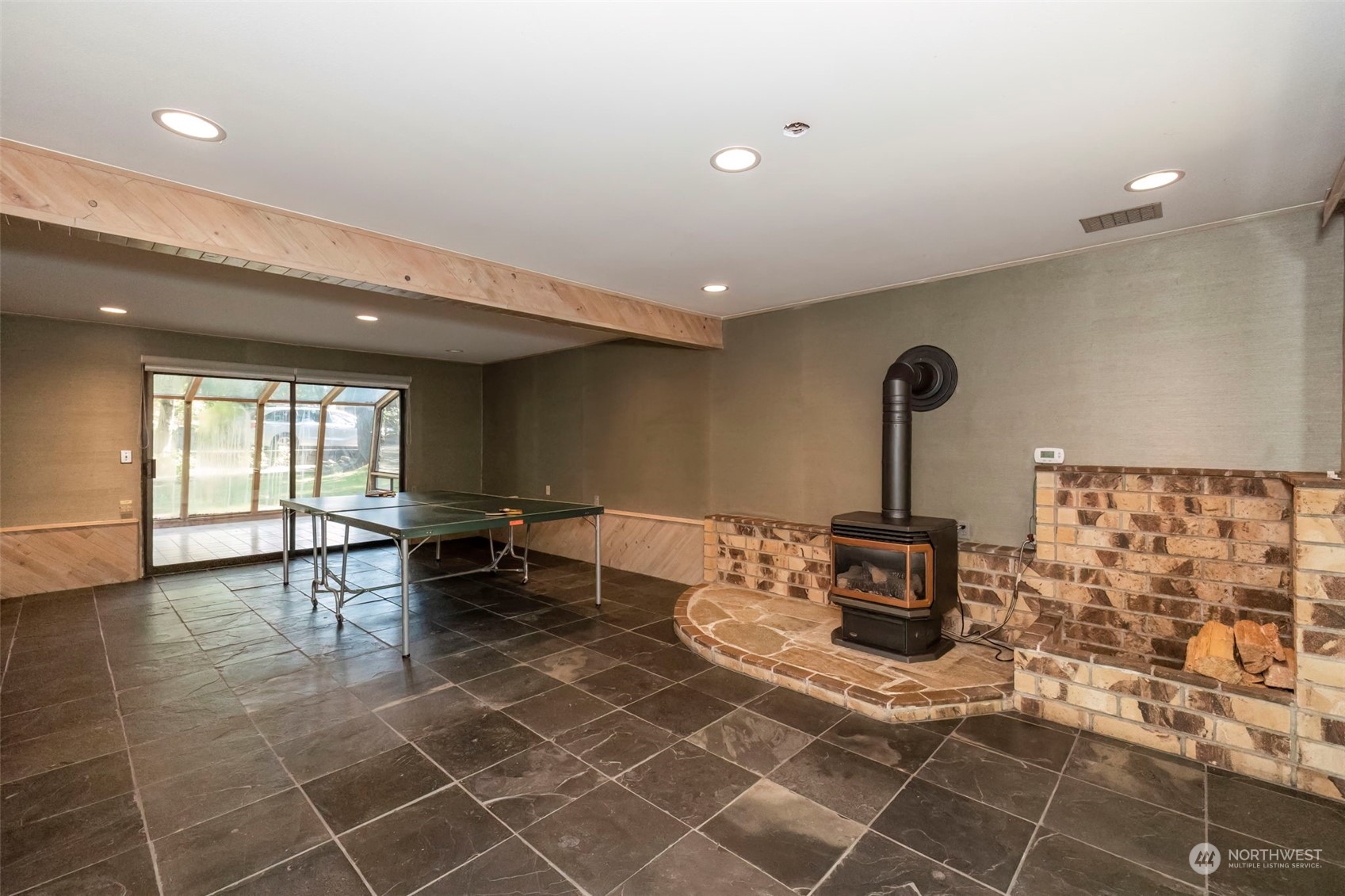 5695 Southwest 44th Street Port Orchard, WA 98367 - Photo 31 of 40 a living room with furniture a window and a table