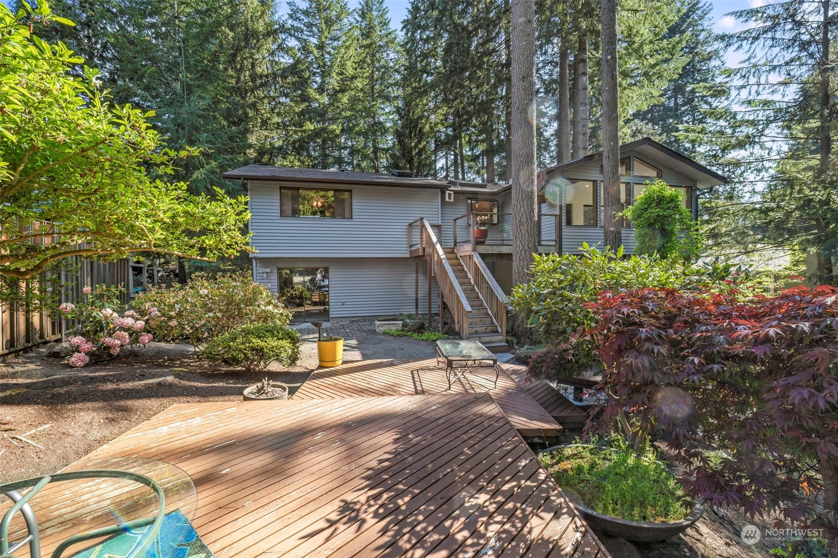 5695 Southwest 44th Street Port Orchard, WA 98367 - Photo 36 of 40 a front view of a house with a yard