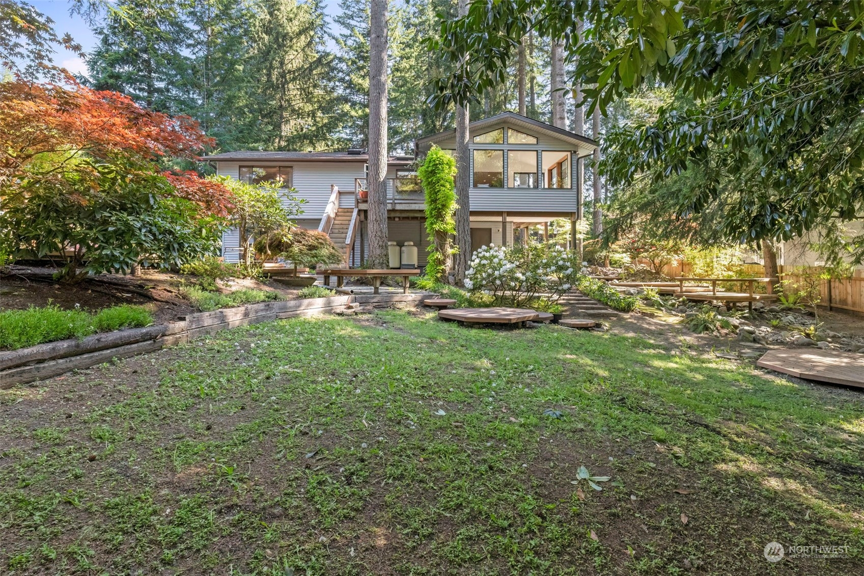 5695 Southwest 44th Street Port Orchard, WA 98367 - Photo 40 of 40 a front view of a house with garden