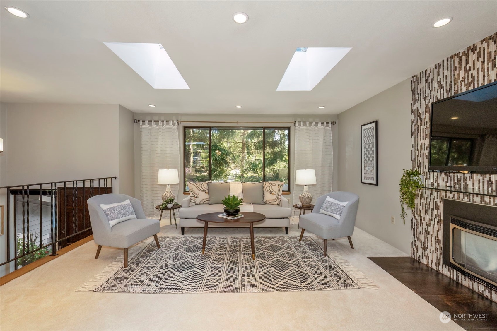 5695 Southwest 44th Street Port Orchard, WA 98367 - Photo 7 of 40 a living room with furniture and a fireplace