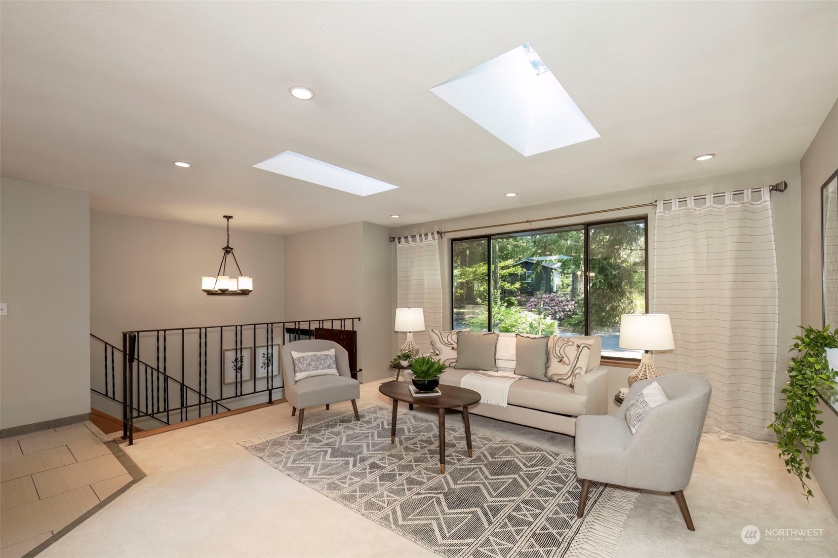 5695 Southwest 44th Street Port Orchard, WA 98367 - Photo 8 of 40 a living room with furniture and a large window
