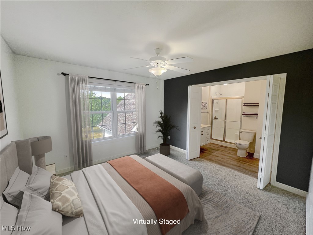 7305 Alexander Road Painesville, OH 44077 - Photo 39 of 50 virtually staged -Bedroom featuring ceiling fan, ensuite bathroom, NEW carpet