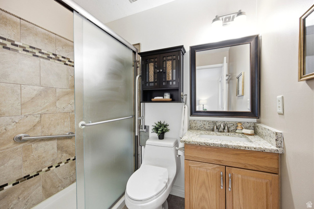 734 Sandy Dunes Drive Sandy, UT 84094 - Photo 19 of 36 Primary Bathroom featuring a tiled shower with no step shower, & granite countertops